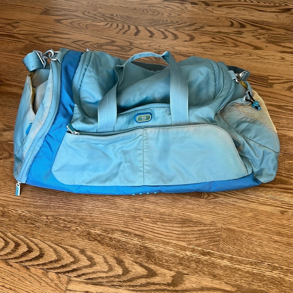 Tumi luggage “Tech” blue duffle bag